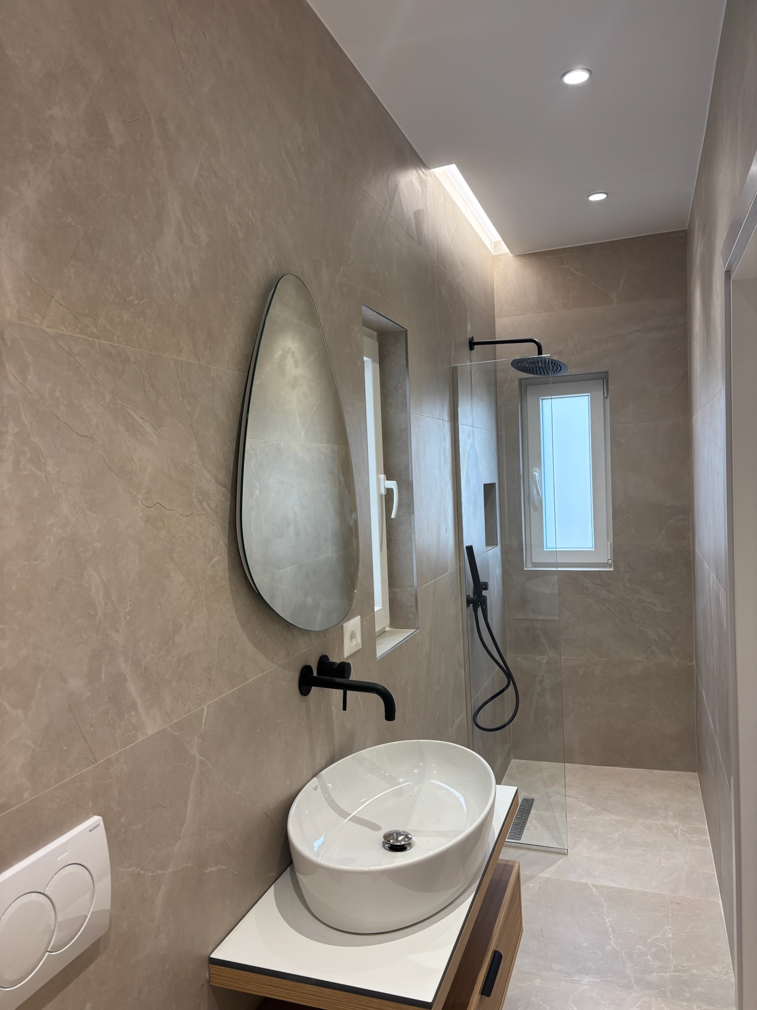Boutique holiday apartment Saranda Albania - elegant bathroom with glass shower